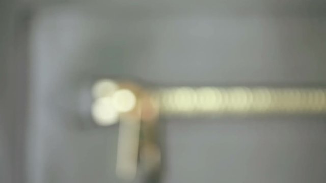 Close up of womens tote bag from gray leather