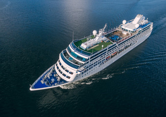 Aerial view of cruise liner sailing in the open sea
