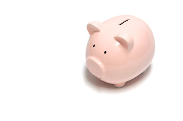 close up on piggy bank isolated on white background