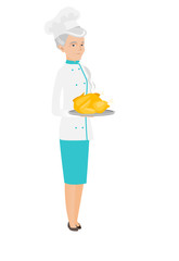 Senior caucasian chef holding roasted chicken.