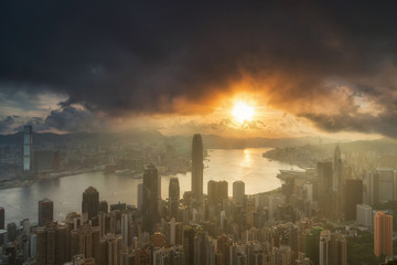 Aerial View of Hong Kong Cityscape on the sunrise time from the peak location which can see down town and Victoria harbour