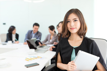 Group of asian business people in meeting room