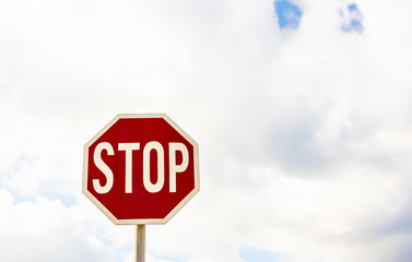road sign stop on a sky background