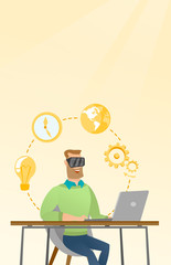 Businessman in vr headset working on a computer.