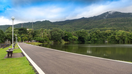 Fototapeta na wymiar The road along the reservoir in Chiang Mai University,Thailand.