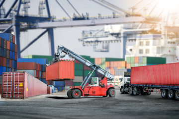 Logistics import export background and transport industry of forklift handling container box loading at port