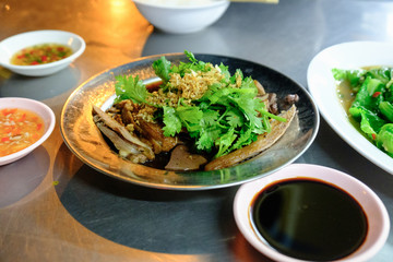The pot stewed duck in the gravy sauce