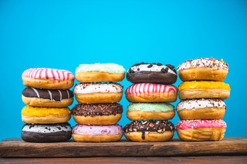 Donut tower stacks on wooden board