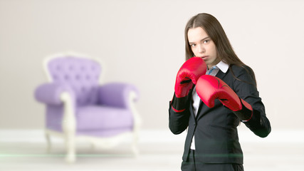 Young beautiful business woman and creative designer standing over blured interior background
