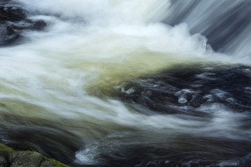 Rushing water at base of Carpenter's Falls in Granby, Connecticut.