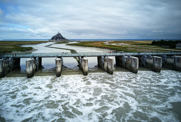 High tide on a dam near Mont Saint Michel, France