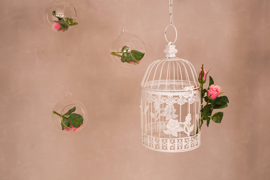Shabby chic decorating with beautiful vintage birdcage and flowers