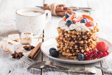 Belgian waffles with creem and berries