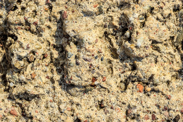 Brown grunge wall stone background or texture nature rock