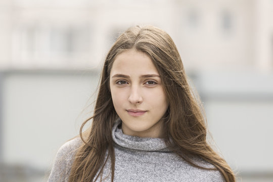 Portrait Of Teenage Girl With Long Brown Hair