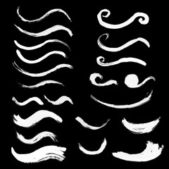 Hand drawn curved brushstrokes created by dry brush. Grunge style set.
