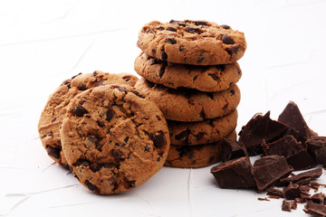 Chocolate cookies on white background. Chocolate chip cookies shot