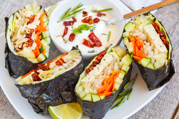 Vegan onigirazu with tofu and vegetables. Healthy vegan dinner concept.