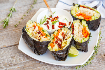 Vegan onigirazu with tofu and vegetables. Healthy vegan dinner concept.