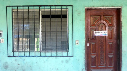 Fototapeta na wymiar Door from a closed house