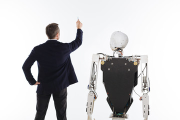 Brilliant engaged scientist writing something down