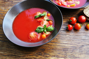 Homemade Gazpacho tomato soup in brown bowl. Healthy eating concept