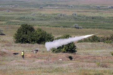 An US soldier fires a Stinger missile a joint US-Romanian military drill, on July 19, 2017, in Capu Midia, Romania.