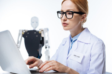 Young serious scientist focused on her project