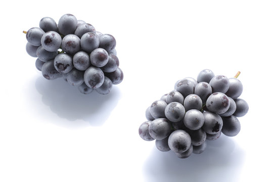 Japanese black grape on white
