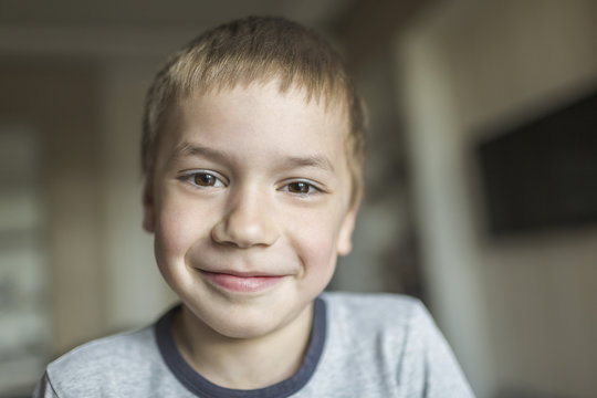 Portrait of smiling boy at home