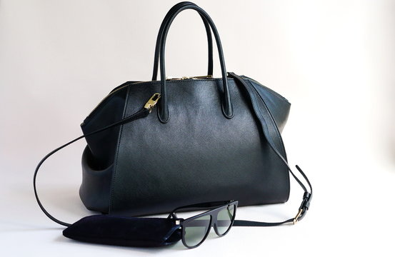 Woman Fashion Luxury Leather Black Bag And Sunglasses Isolated