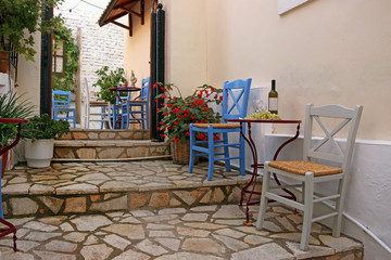Fototapeta na wymiar Wine and grapes on the table Parga Greece