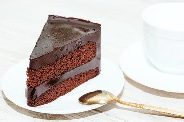 Chocolate cake on wooden table