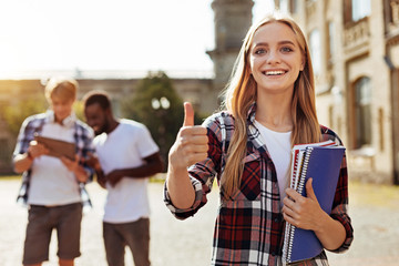 Ambitious pretty woman satisfied with her study