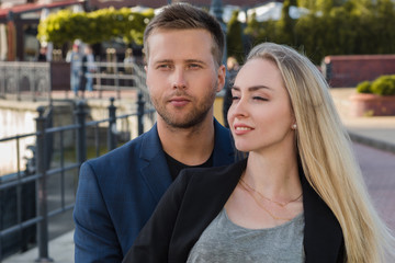 Naklejka premium Couple in love. Portrait of attractive happy girl and the guy