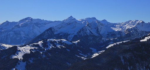 Hohe Wispile, Oldenhorn and other snow covered mountains near Gstaad.