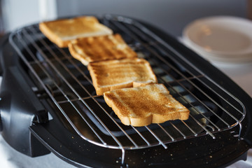 Toast bread on toaster