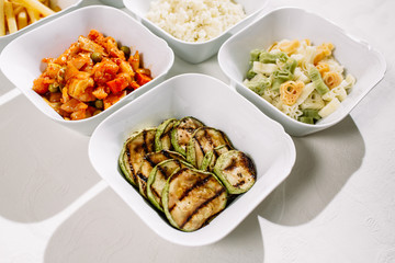 Mixed rice, potatoes, zucchini grill, colorful pasta, pepper on the grill