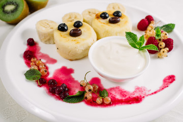 Cottage cheese pancake like bear, selective focus. Shot for a story on homemade, organic, healthy baby foods.