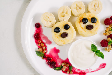 Cottage cheese pancake like bear, selective focus. Shot for a story on homemade, organic, healthy baby foods.