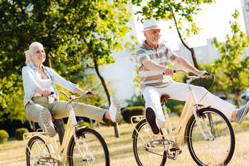 Funny elderly people enjoying active vacation