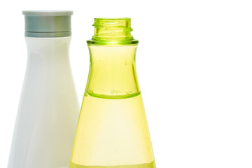 Beauty bottles closeup (yellow and white)