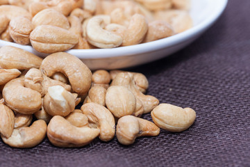 stack of Cashews on bowl
