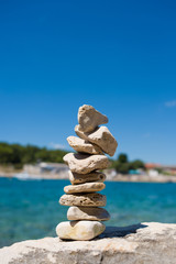 Fototapeta na wymiar Stapled stones at the beach in Croatia