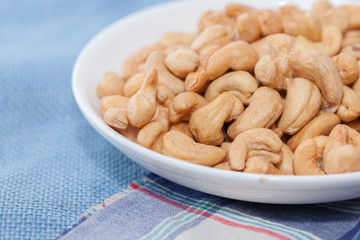 stack of Cashews on bowl