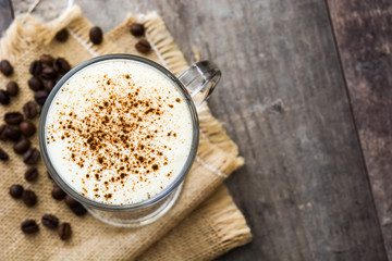 Irish coffee in glass on wooden table
