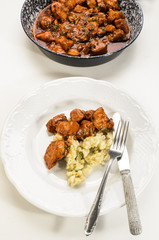 hungarian style chicken goulash with dumplings on a plate