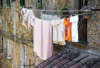 Laundry hanging out of a typical Italian facade