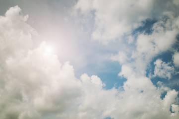 Blue sky with white clouds. Day, background.