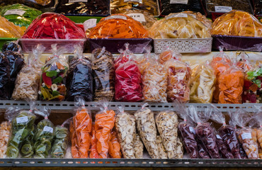 Bags of sweet candy on display sale in street market